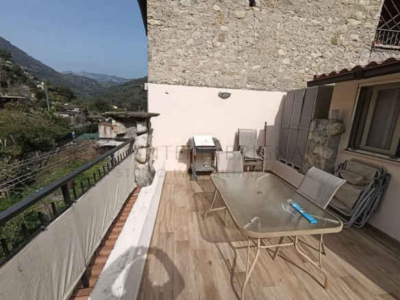 Terracielo ristrutturato con terrazza